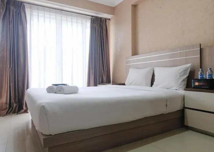 Homey Studio Apartment At Gateway Pasteur By Travelio